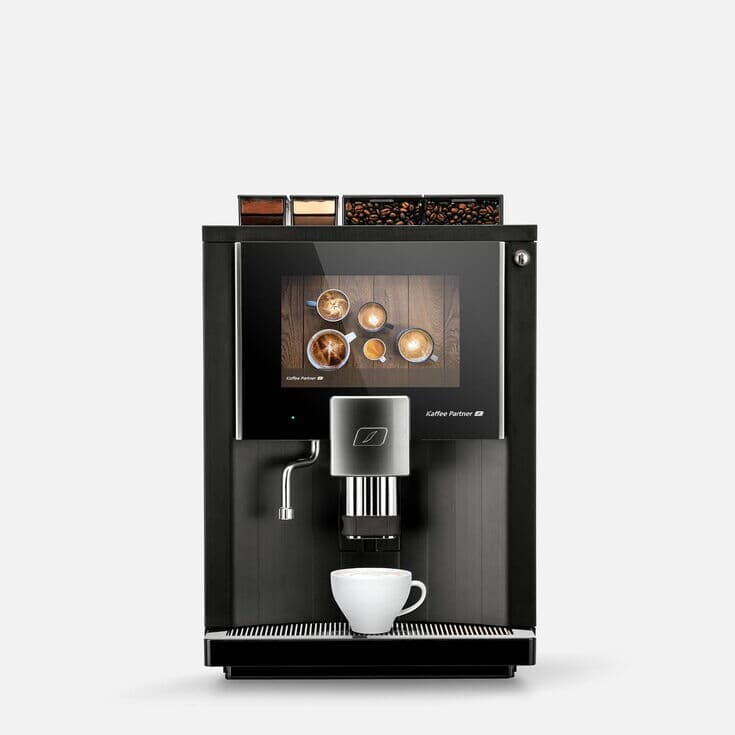 The coffee machine BARISTA Velluto by Kaffee Partner in the front view, displayed on a gray background.